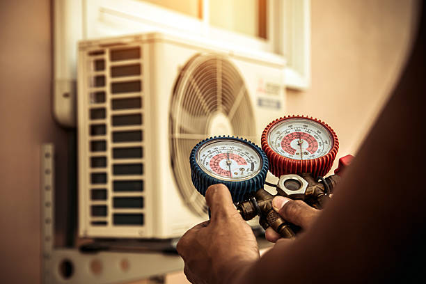 Professional Hvac technician working in Wellsville, UT